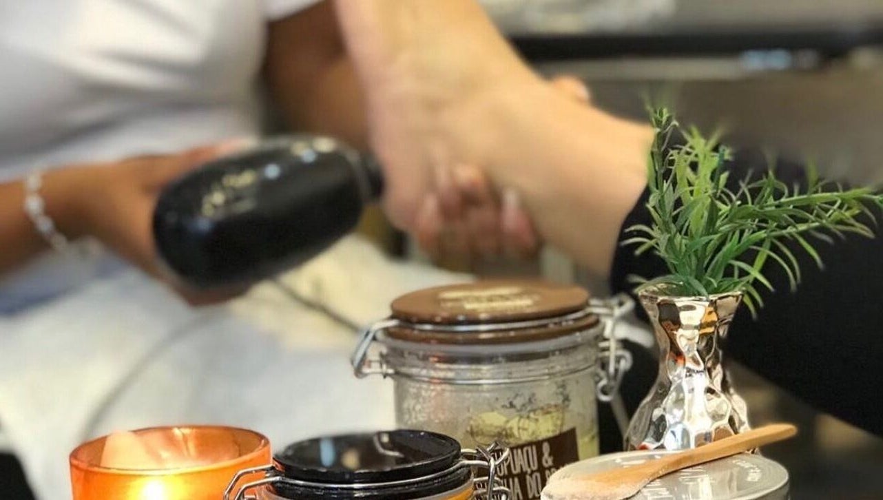 Relaxing pedicure scene at Studio Karla Horrana, Amsterdam, Noord-Holland, NL with candles and natural oils.