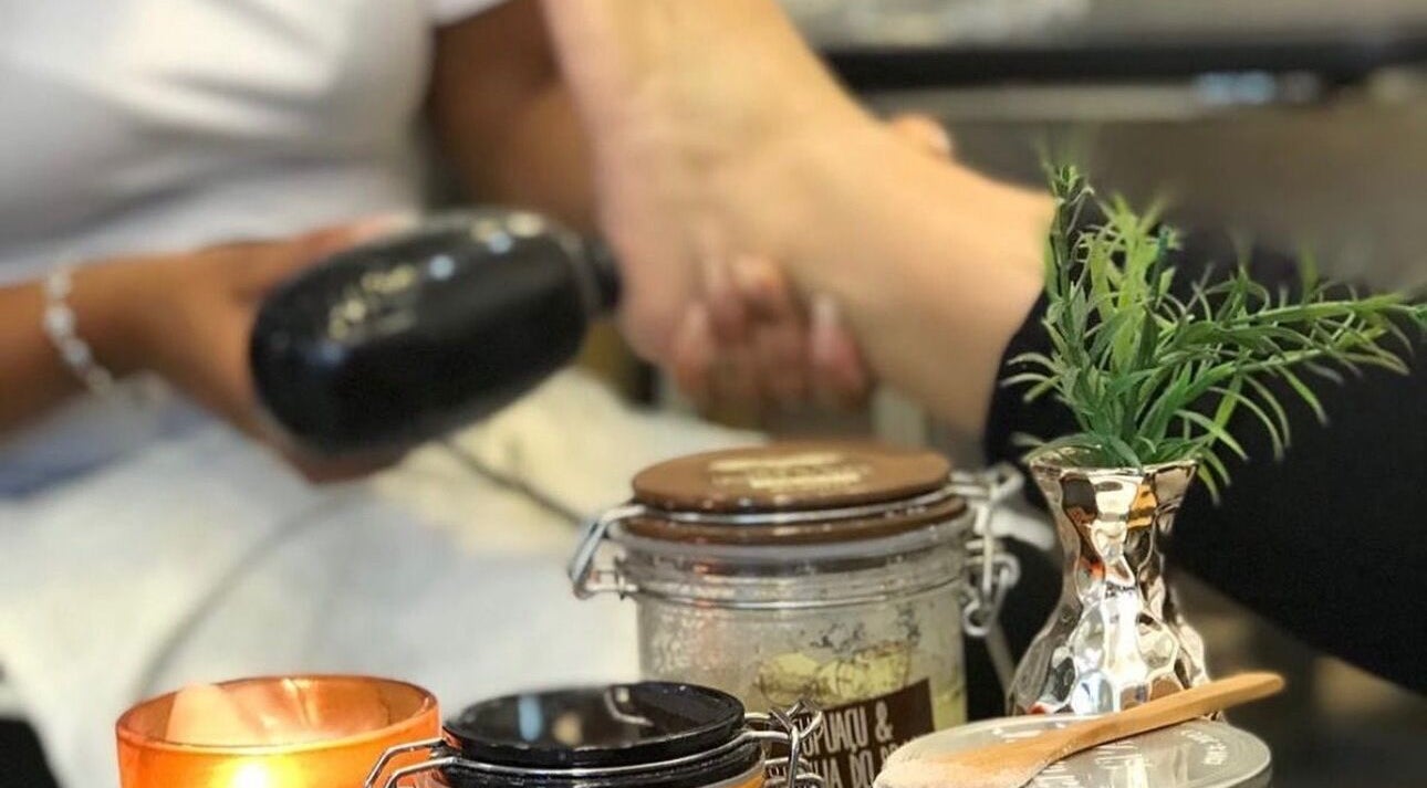 Relaxing pedicure scene at Studio Karla Horrana, Amsterdam, Noord-Holland, NL with candles and natural oils.