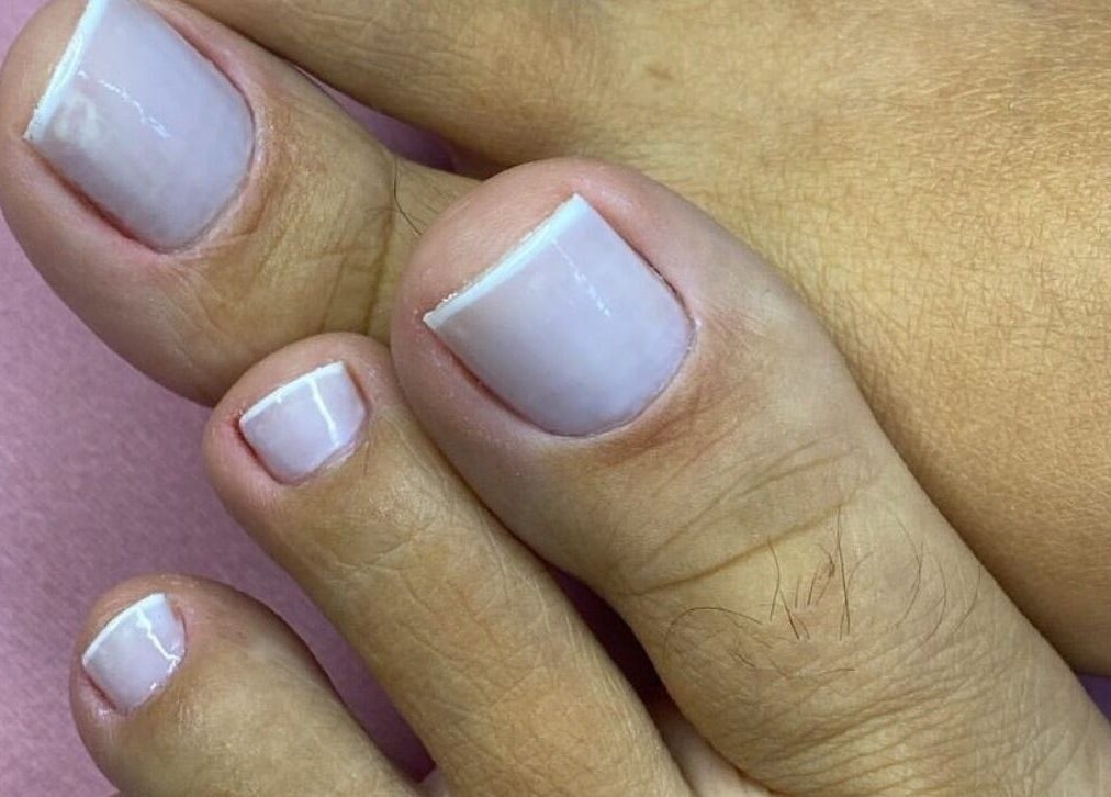 Close-up of neatly polished toenails at Studio Karla Horrana, Amsterdam, Noord-Holland, NL.