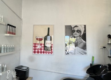 Stylish interior of Isla hair in Maroochydore, Queensland, AU with art and beauty products.