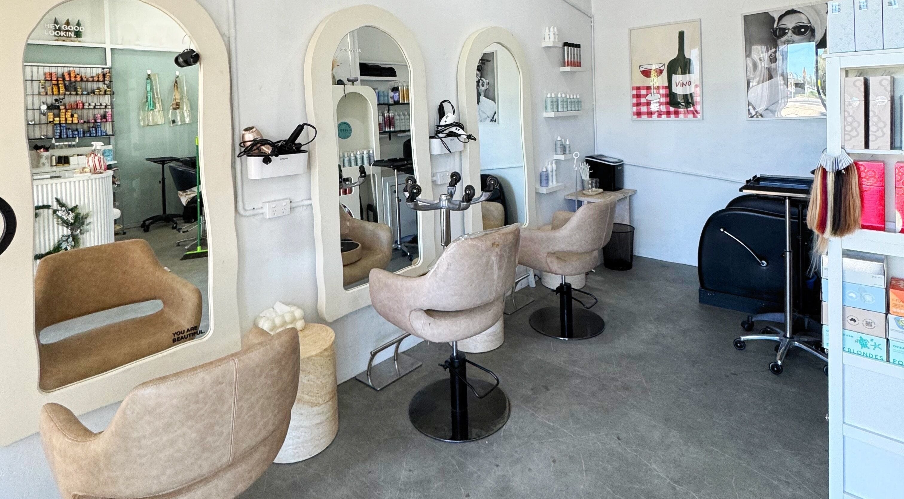 Luxurious styling chairs and mirrors at Isla Hair, Maroochydore, Queensland, AU creating a modern salon vibe.