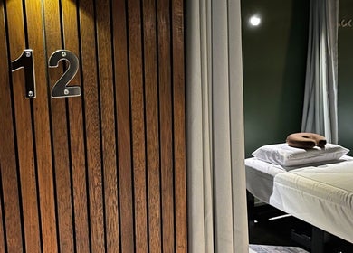Relaxing massage room at NUAT THAI Ortigas Extension (ORTEx), Cainta, Calabarzon, PH with cozy bedding and mood lighting.