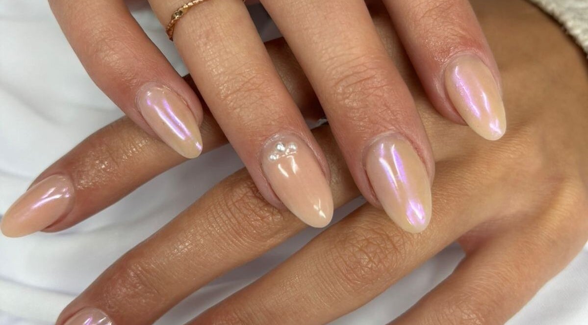 Iridescent nude nails with pearl accents at Danischa Nails, Centurion, Gauteng, ZA.