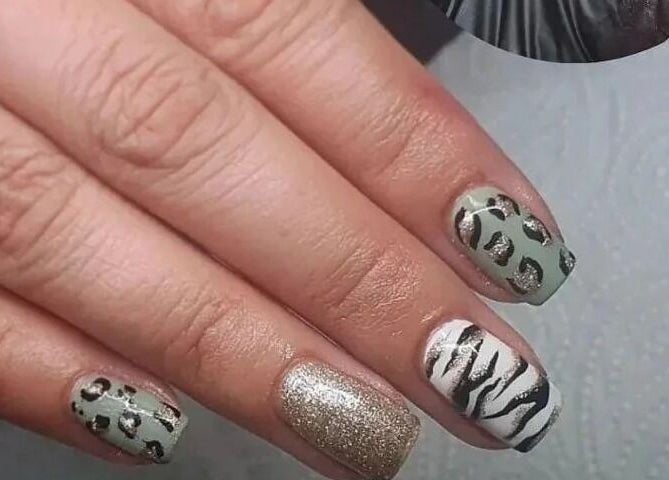 Close-up of animal print nail art at Lash L'uxe & Beauty, Peterborough, England, GB.