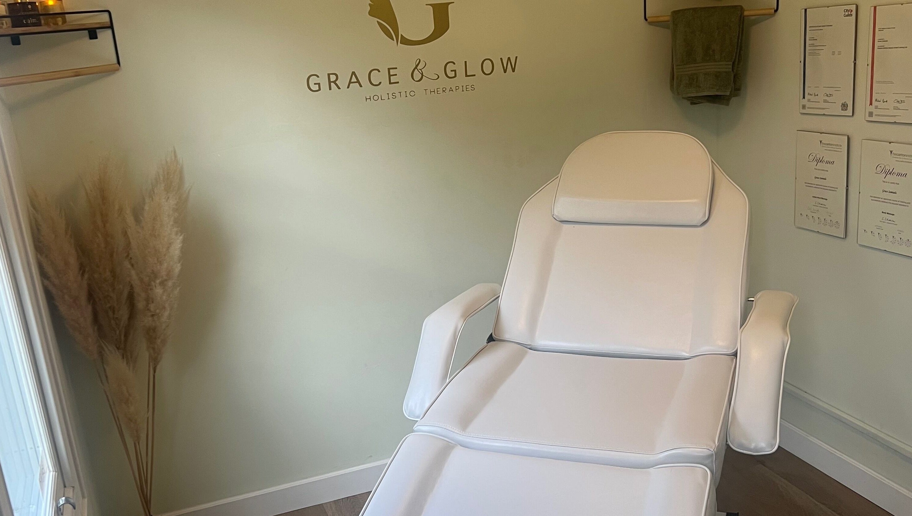 Elegant treatment room at Grace & Glow, Maidstone, England, GB, highlighting a plush white chair.