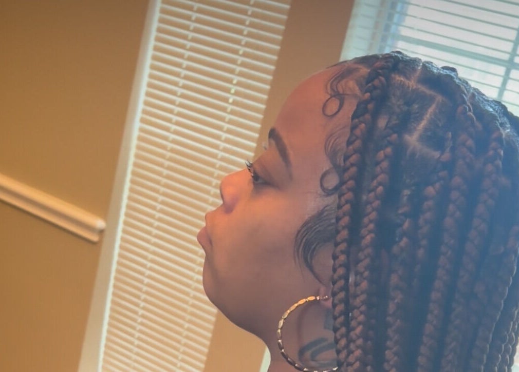 Braided hairstyle showcased at Slayed By C Cimone in Houston, Texas, US.