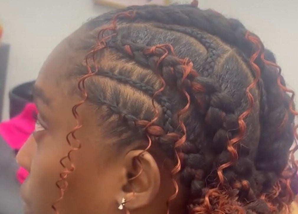 Intricate braids with copper highlights at Slayed By C Cimone, Houston, Texas, US.