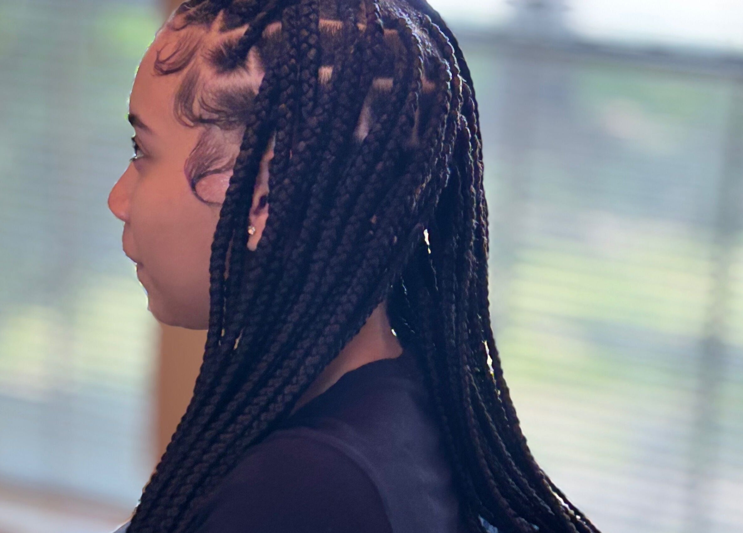 Intricate braids hairstyle at Slayed By C Cimone, Houston, Texas, US salon showcases expert styling.