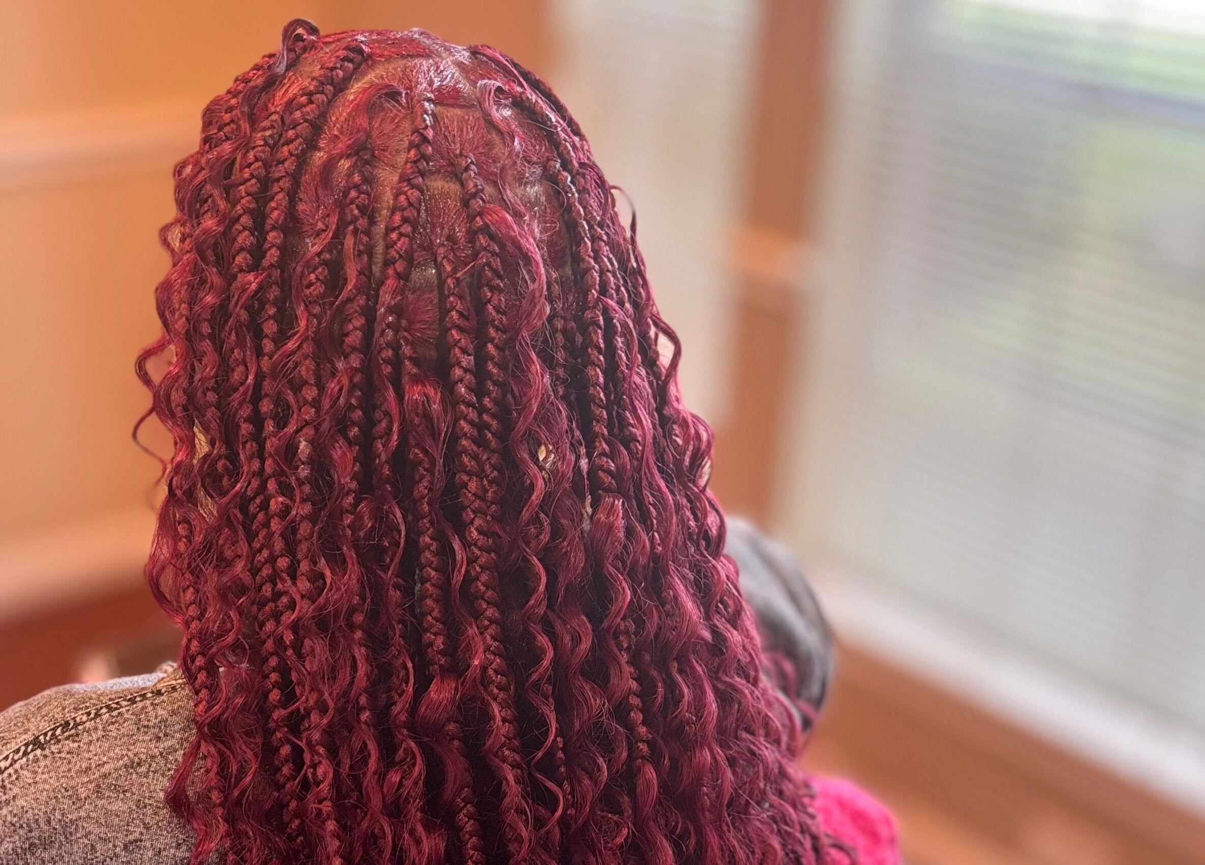 Elegant red braids hairstyle at Slayed By C Cimone, Houston, Texas, US, capturing intricate design.