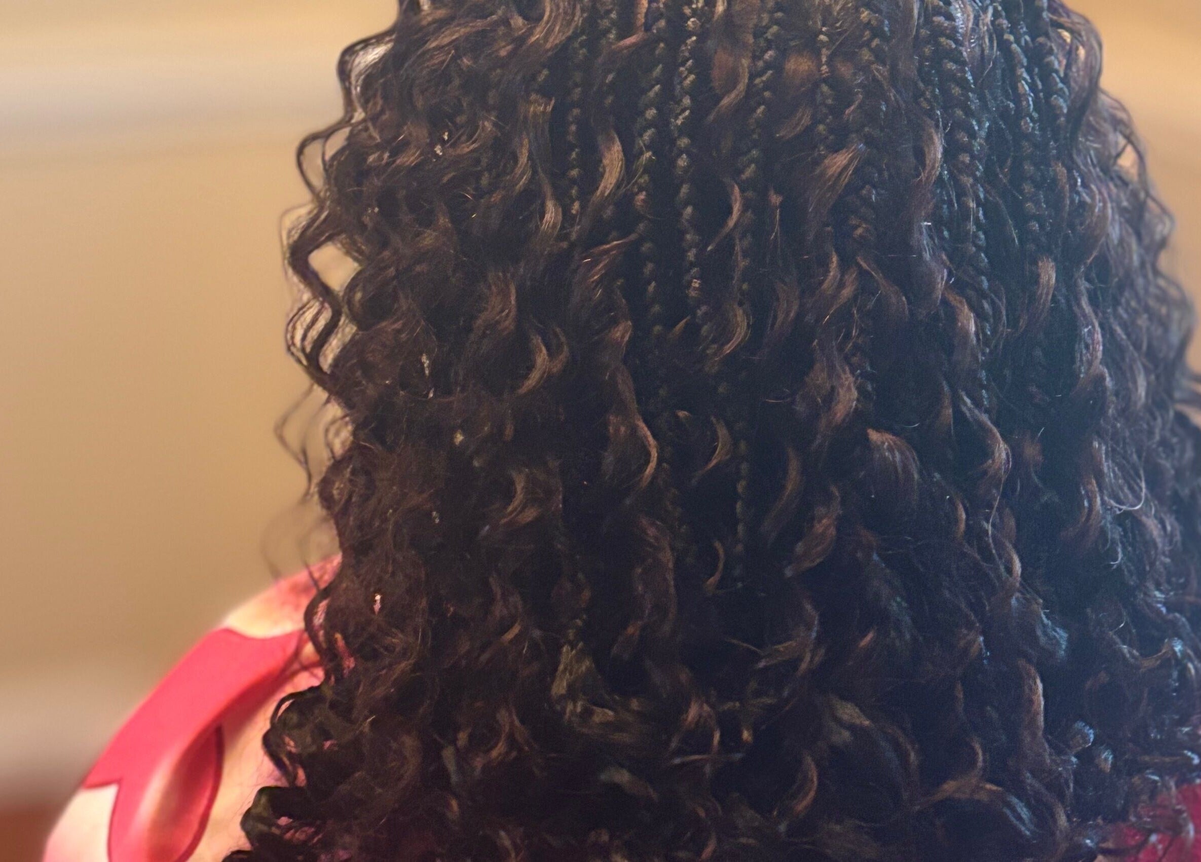 Beautiful curly braids at Slayed By C Cimone in Houston, Texas, US, showcasing textured styling.