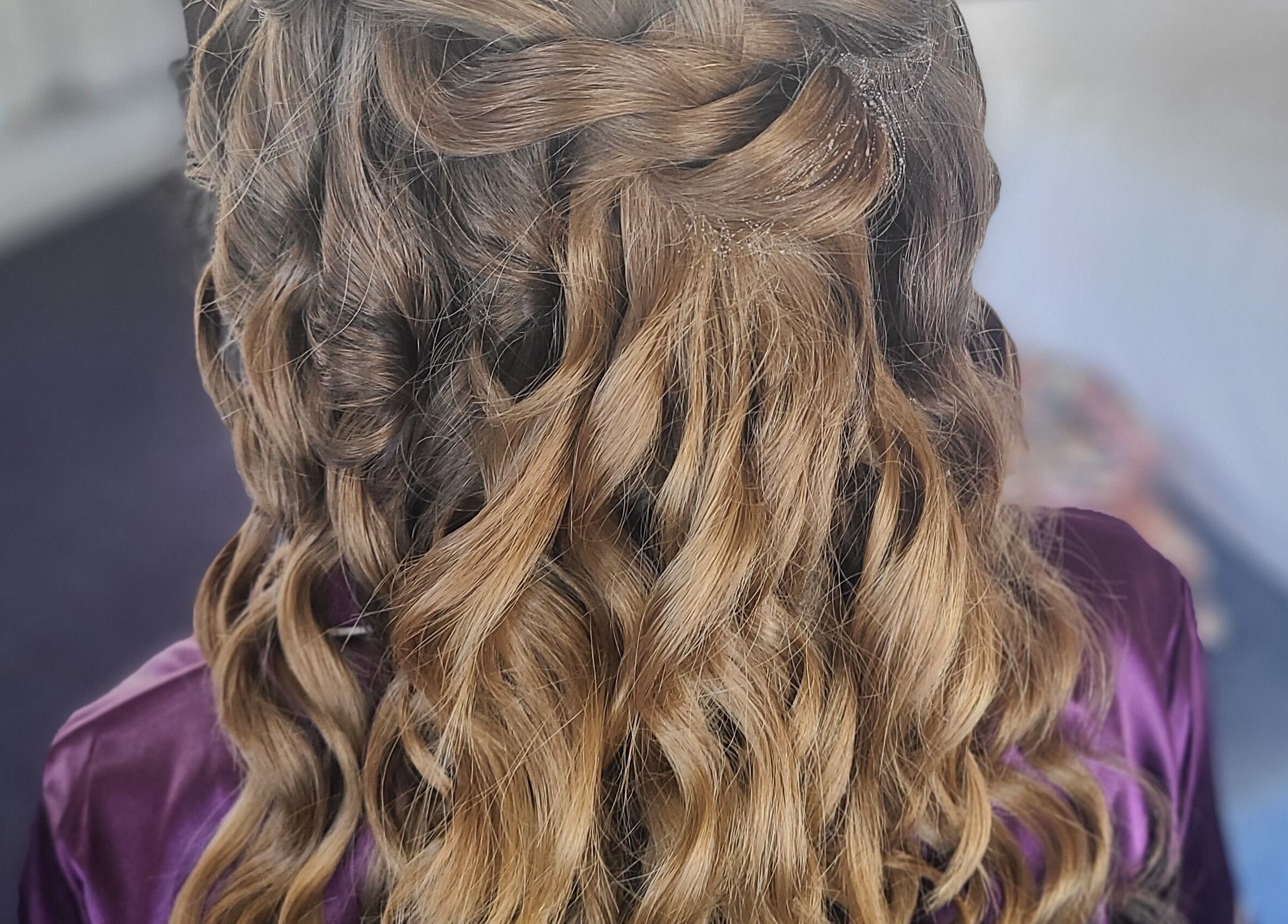 Elegant curly hairstyle at Gorgeous You Salon & Spa in Bridgeview, Illinois, US.