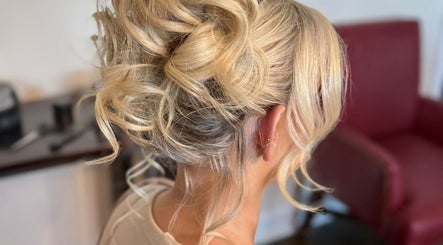 Blonde updo hairstyle at Gorgeous You Salon & Spa, Bridgeview, Illinois, US, highlighting expert styling.
