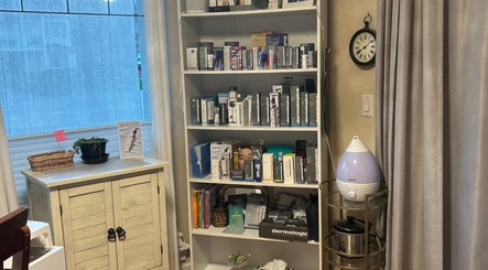 Skincare products on display at Caring Esthetics, British Columbia, CA enhancing a serene ambiance.