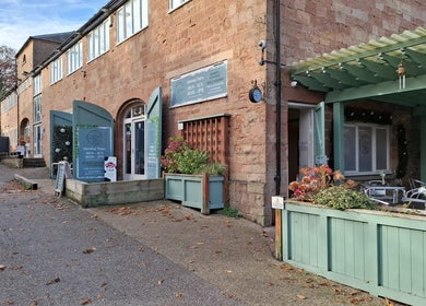 Rustic exterior of Restore & Align Massage Therapy, Mansfield, England, GB, inviting relaxation.