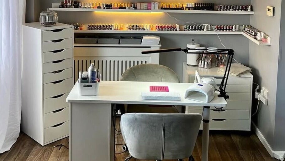 Pampered Beauty nail studio in Elphinstone, Scotland, GB, featuring modern manicure stations and organized polishes.