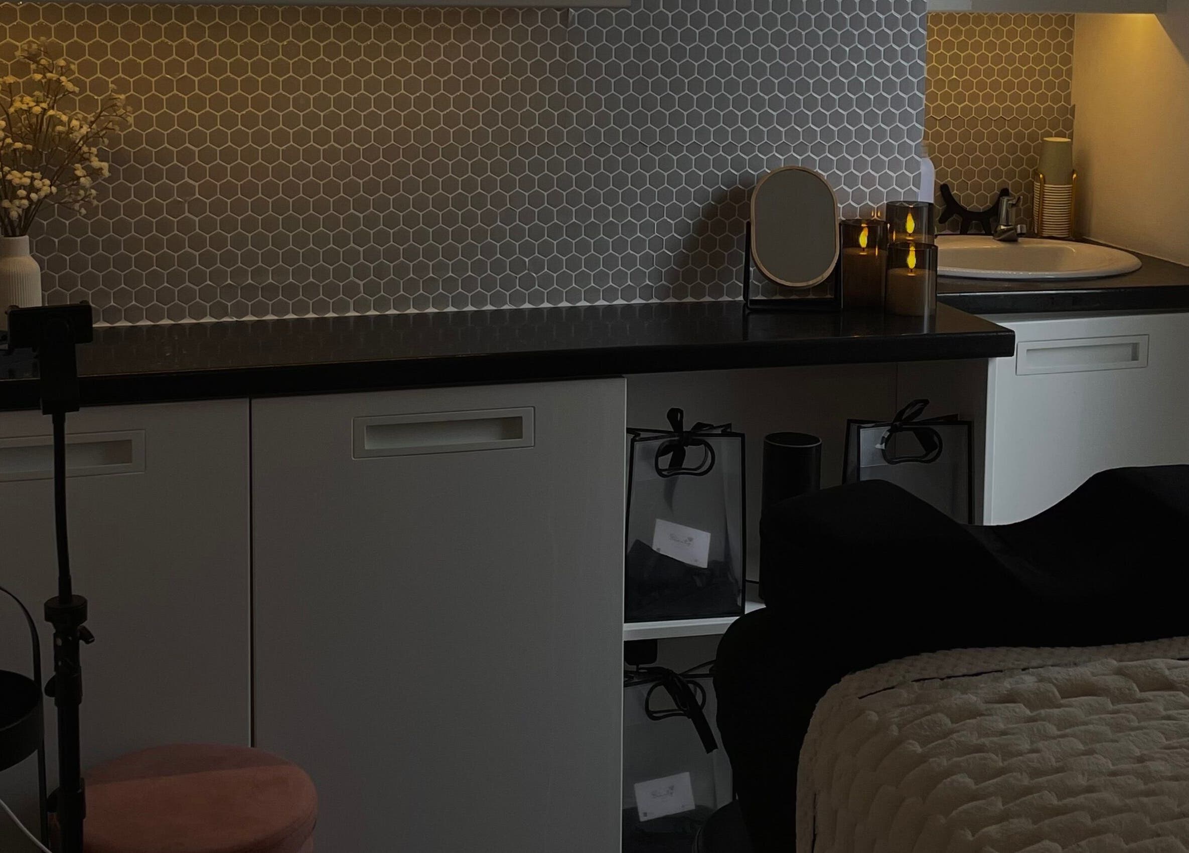 Relaxing treatment space at HB Beauty Hive, Dorridge, England, GB, featuring cozy lighting and modern design.