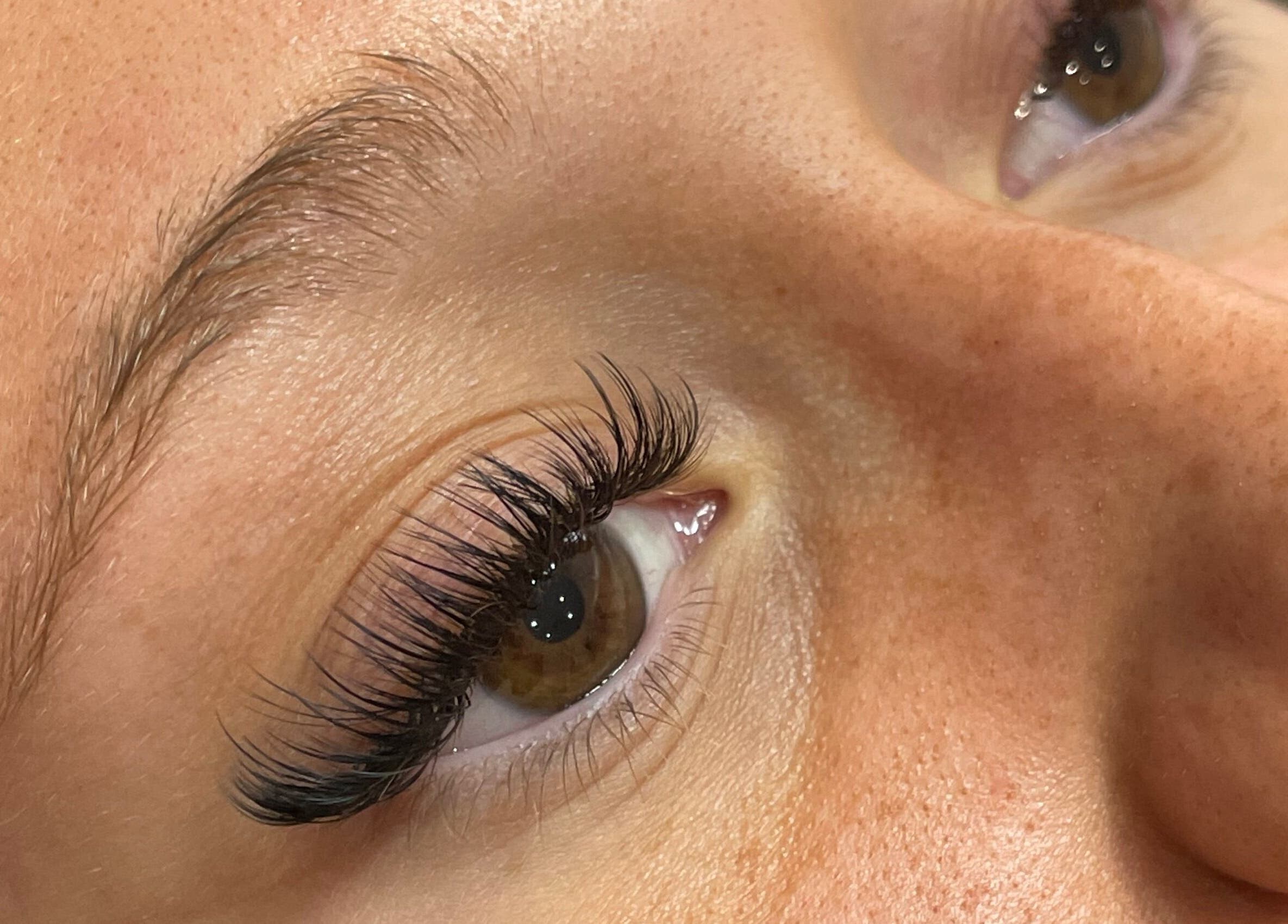 Close-up of expertly applied eyelash extensions at HB Beauty Hive in Dorridge, England, GB.