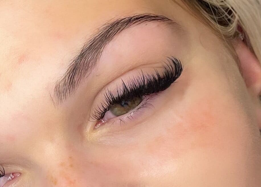 Close-up of eye with lush lashes at HB Beauty Hive, Dorridge, England, GB.