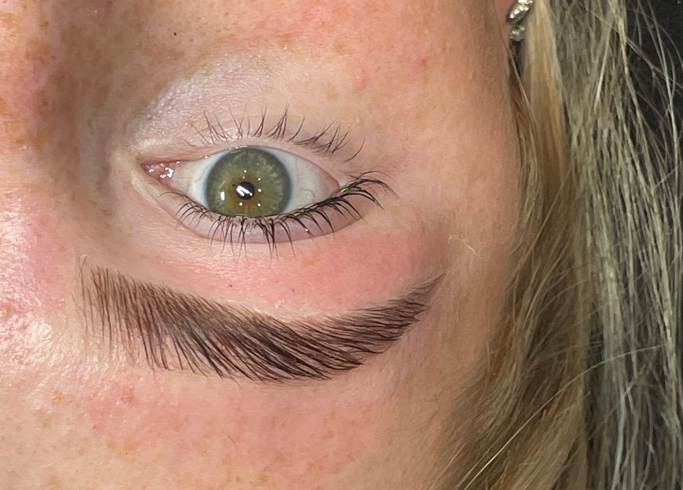 Close-up of an eye with styled eyebrow at HB Beauty Hive, Dorridge, England, GB.