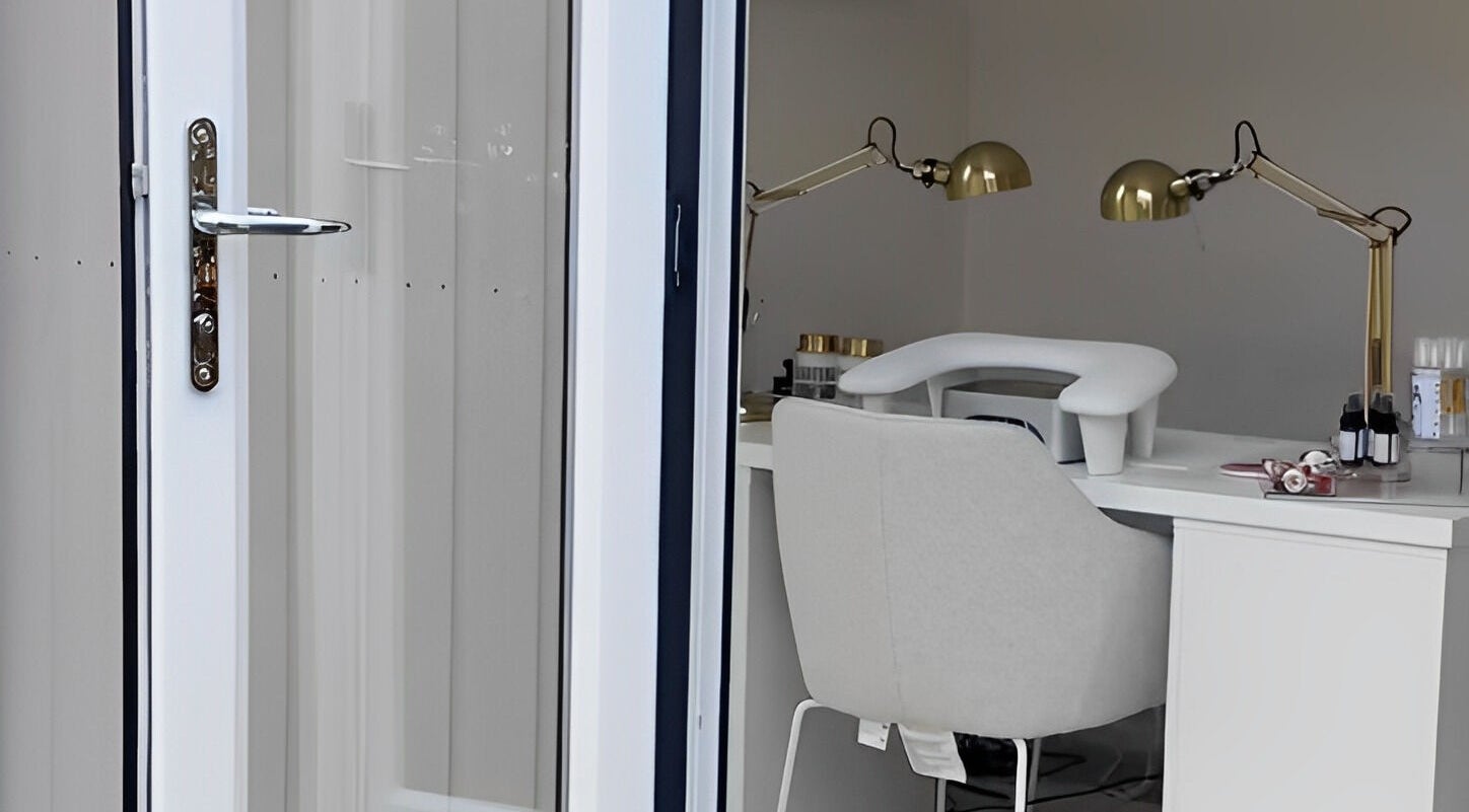 Manis By Mais in Epsom, England, GB showcases a chic nail station with a modern aesthetic.