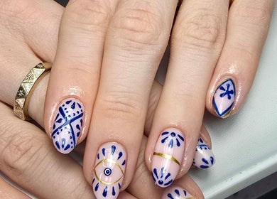 Intricate blue and gold nail art at Nails by Nicole in Oughtibridge, England, GB.