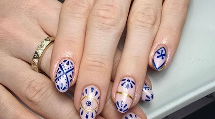 Intricate blue and gold nail art at Nails by Nicole in Oughtibridge, England, GB.