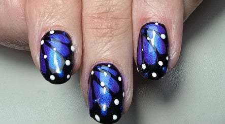 Butterfly nail art by Nails by Nicole in Oughtibridge, England, GB. Stunning purple and black design.