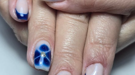 Blue floral nail art by Nails by Nicole in Oughtibridge, England, GB showcases intricate detail and style.