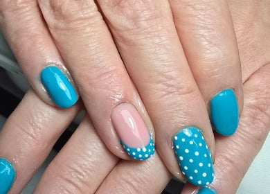 Beautiful teal and polka dot nails by Nails by Nicole in Oughtibridge, England, GB.