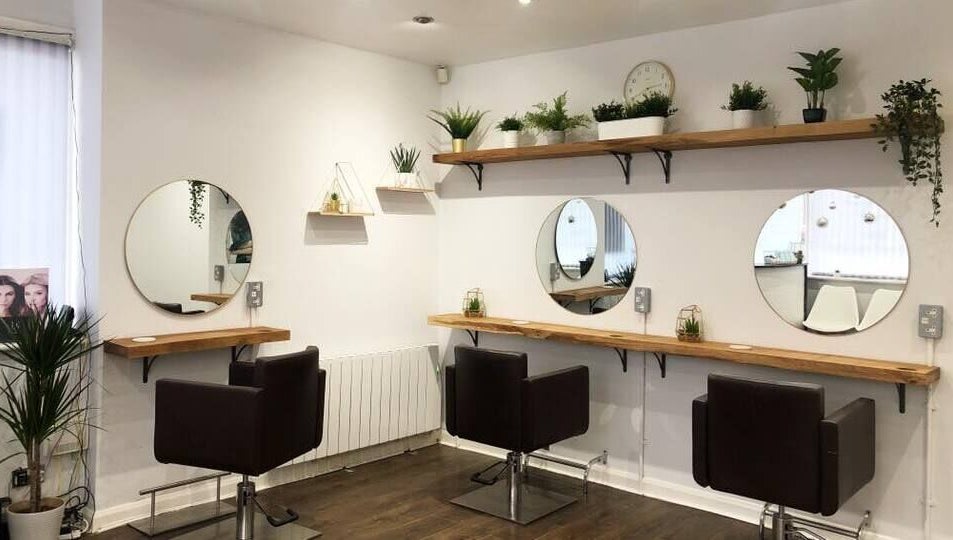 Modern salon chairs and mirrors at Teal Hair Design, Hull, England, GB.