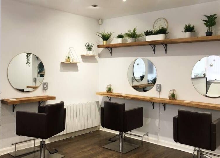 Modern salon chairs and mirrors at Teal Hair Design, Hull, England, GB.