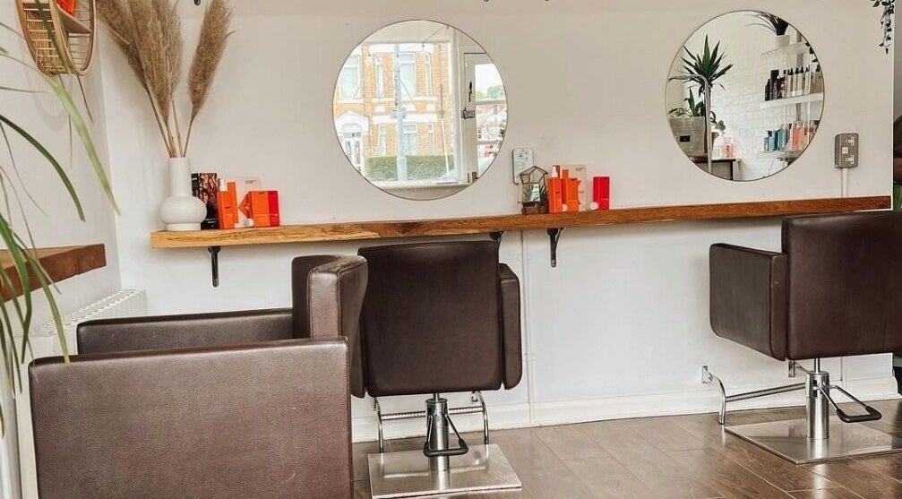Modern salon chairs and mirrors at Teal Hair Design in Hull, England, GB.