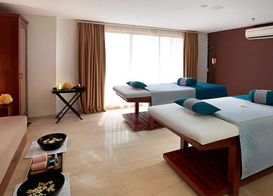 Relaxing massage room at Visala Spa The Bandha, Bali, Bali, ID, featuring two comfortable massage tables.