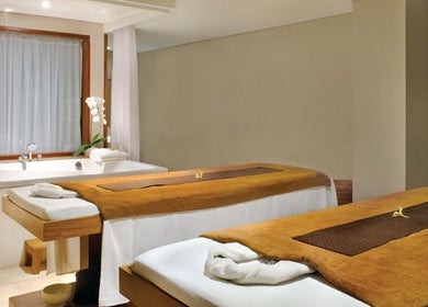 Relaxing spa treatment room at Visala Spa The Bandha, Bali, Bali, ID with two massage beds and a serene ambiance.