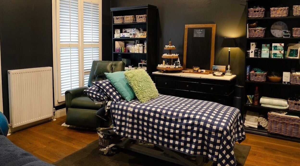 Cozy massage room at GT Massage, Melbourne, Victoria, AU with a comfortable bed and serene decor.
