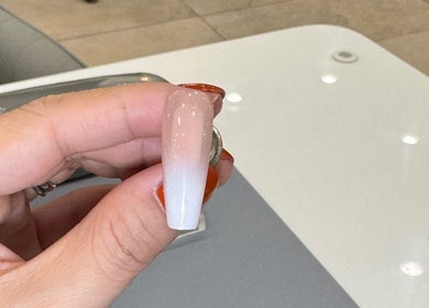 Ombre nail design at New L&T Nail Spa INC in New York, New York, US, showcasing a stylish manicure.