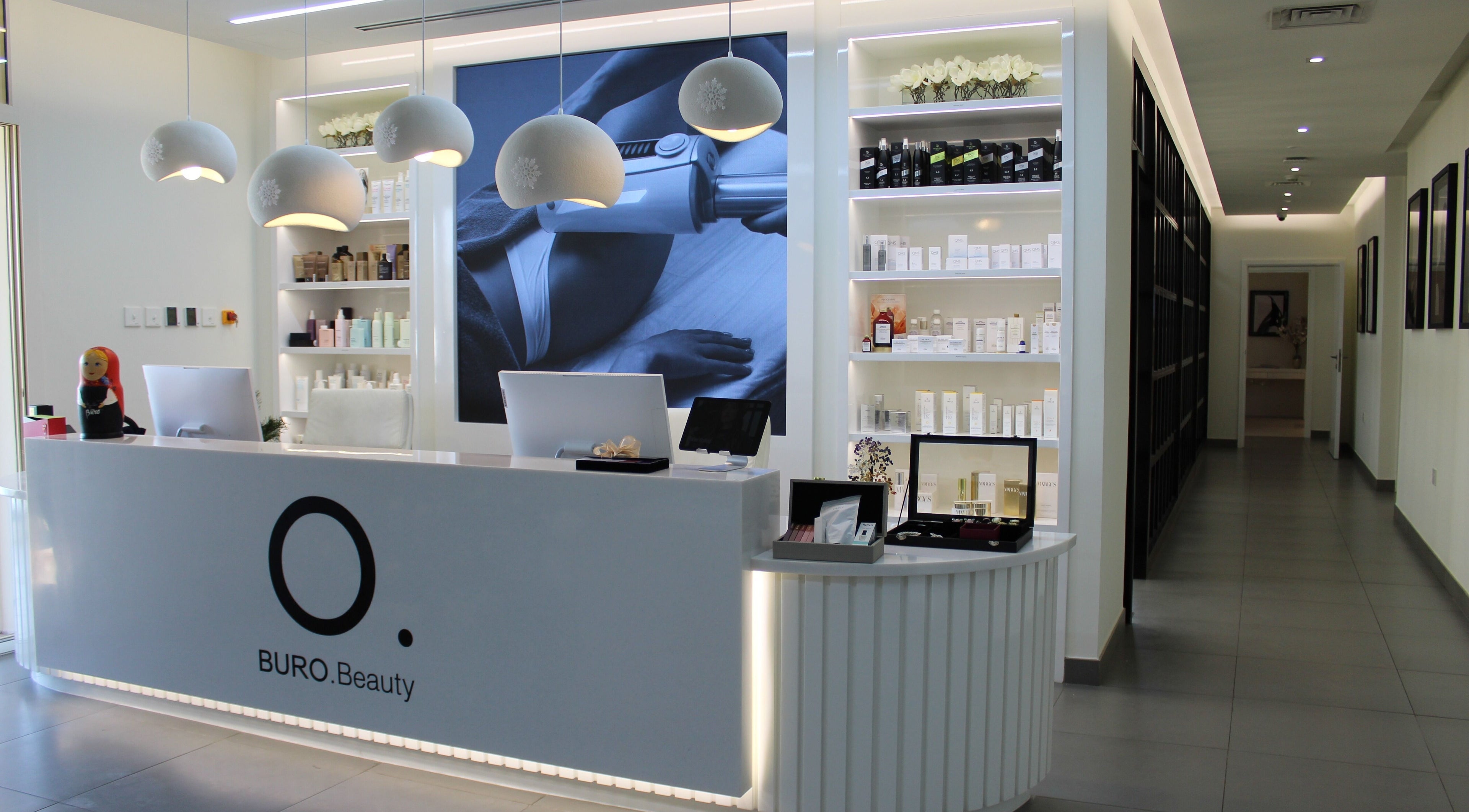 Stylish reception at Buro Beauty Clinic, Dubai, Dubai, AE, showcasing modern decor and product display.