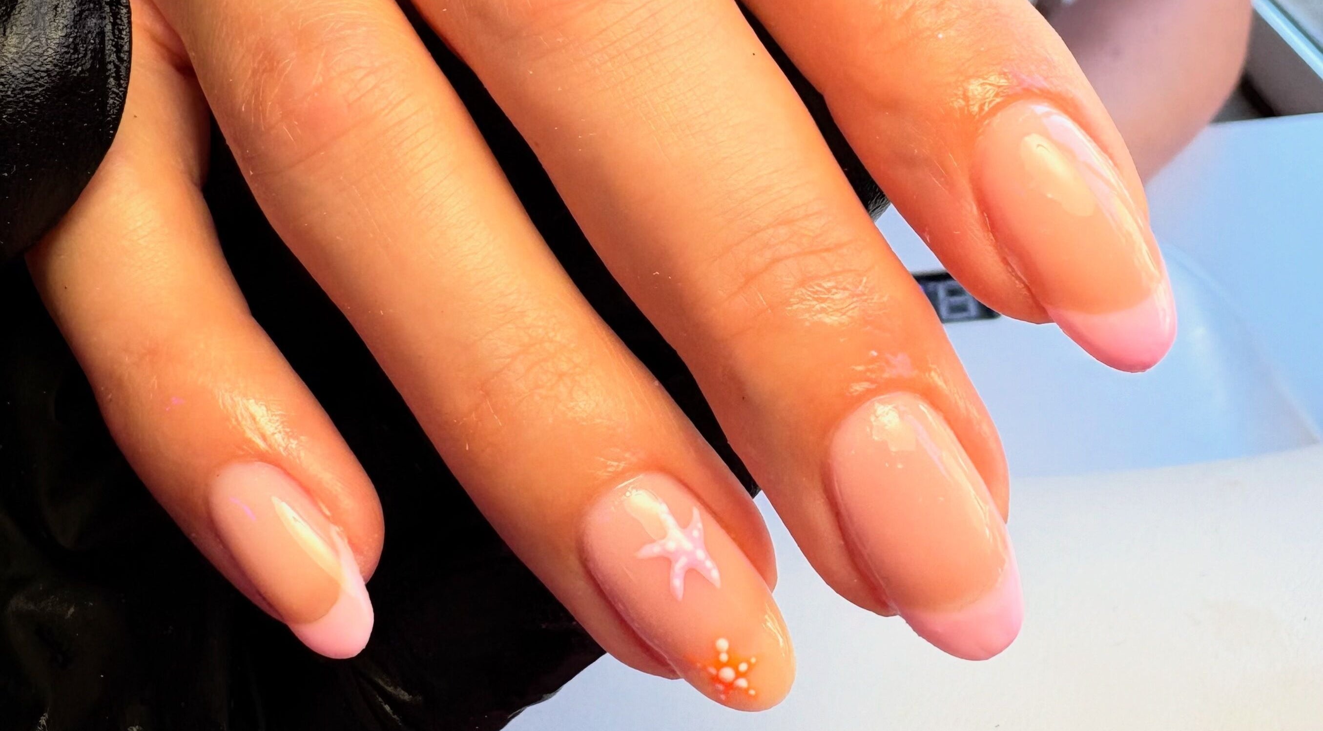 Detailed pink and nude nail art design at Glos Nails by April, Shirley, England, GB.