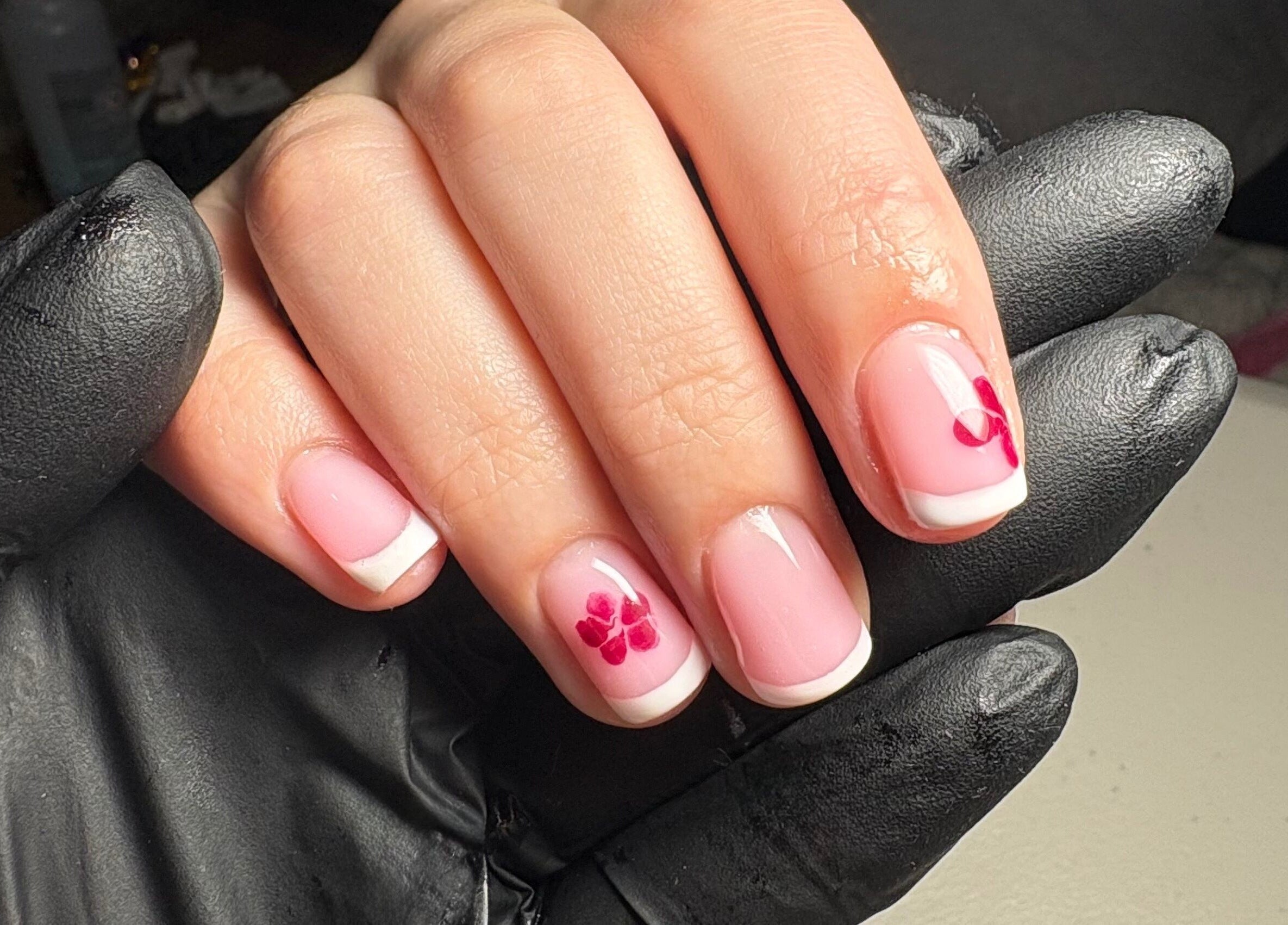 Elegant floral French manicure at Glos Nails by April in Shirley, England, GB, showcasing delicate nail art.
