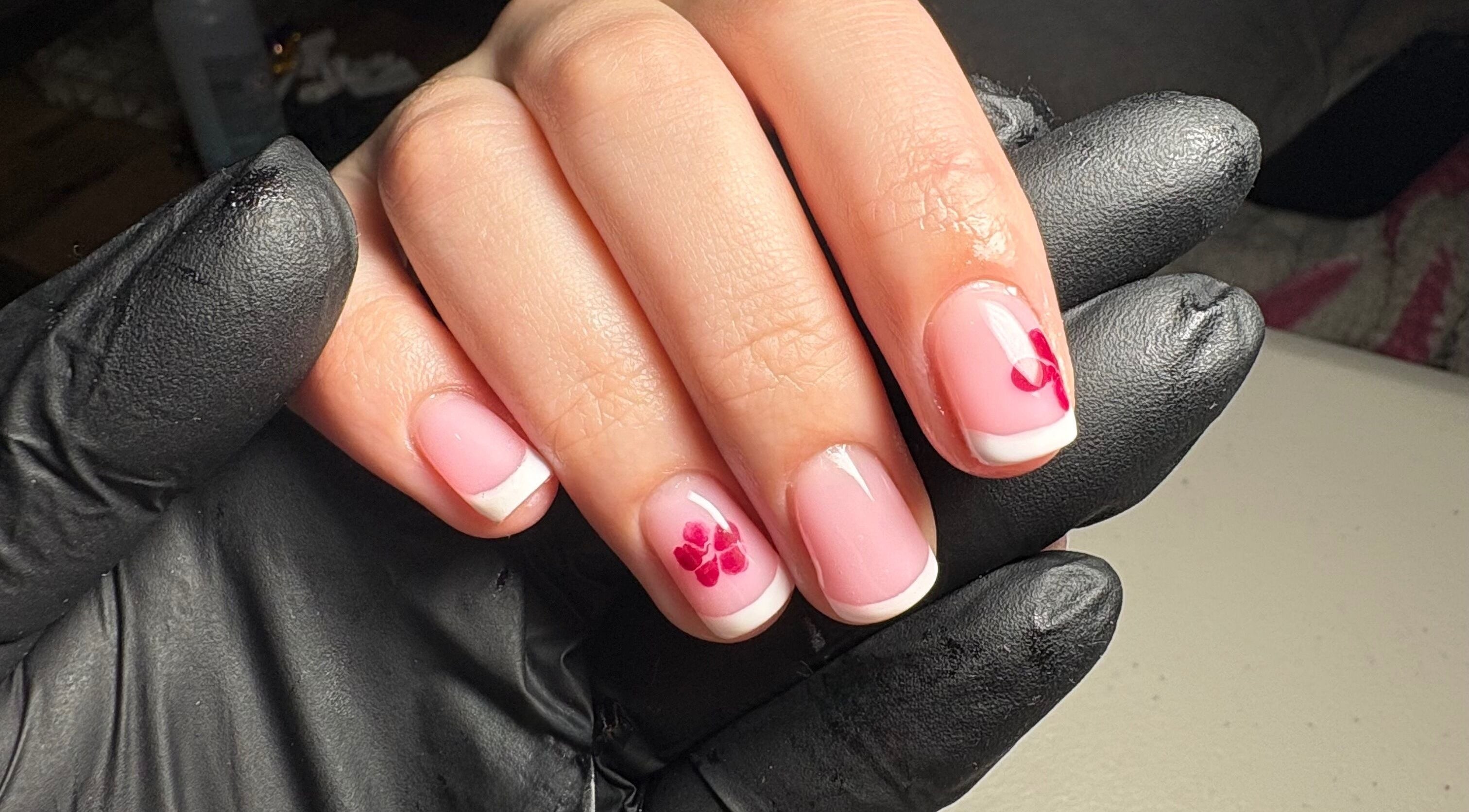 Elegant floral French manicure at Glos Nails by April in Shirley, England, GB, showcasing delicate nail art.