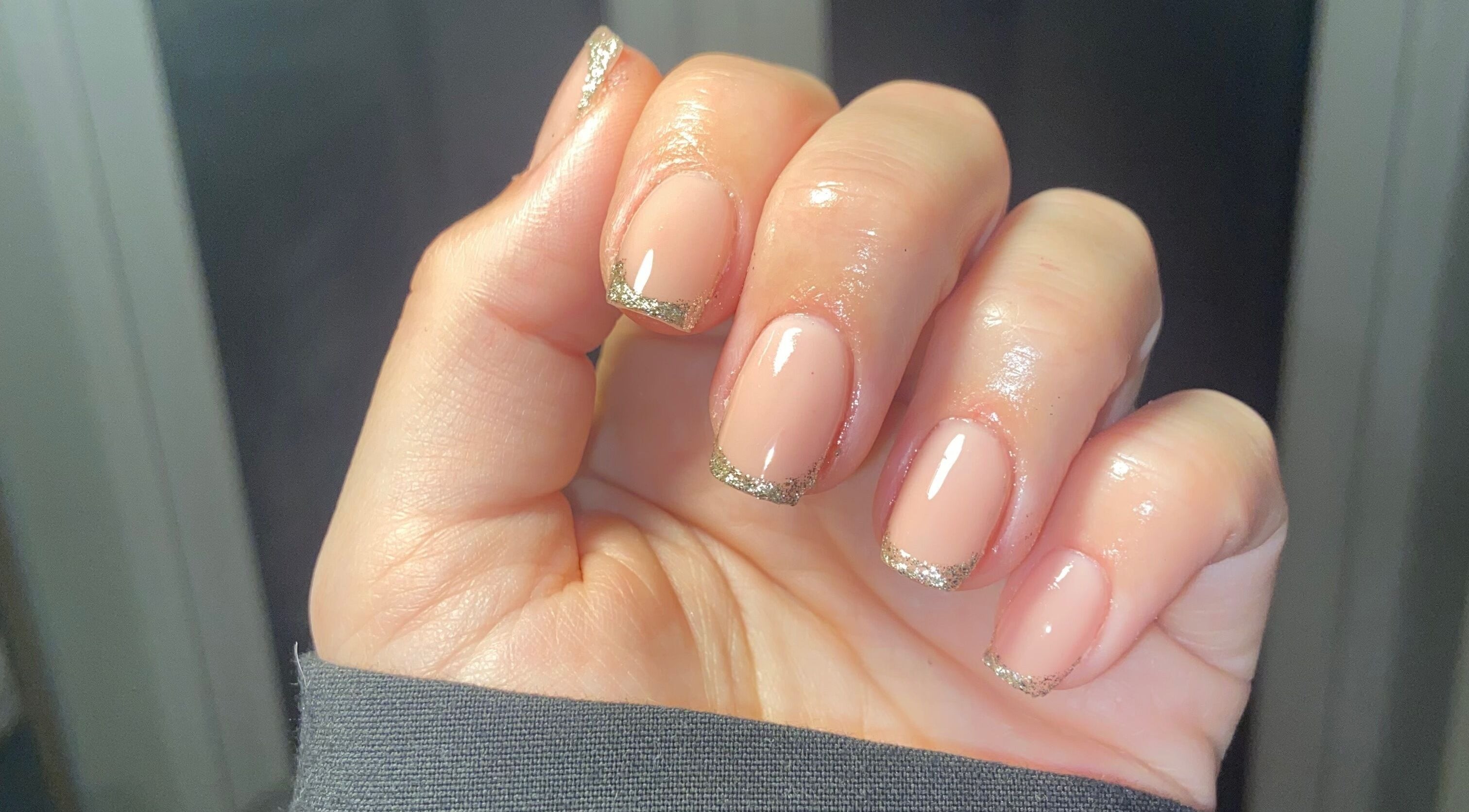Elegant manicure with glitter tips at Glos Nails by April in Shirley, England, GB.