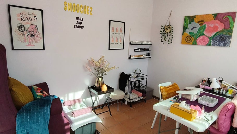 Chic interior of Smoochez Nails and Beauty in Cape Town, Western Cape, ZA, featuring nail care stations and decor.