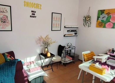 Chic interior of Smoochez Nails and Beauty in Cape Town, Western Cape, ZA, featuring nail care stations and decor.