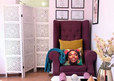Elegant relaxation corner at Smoochez Nails and Beauty in Cape Town, Western Cape, ZA, with plush seating and decor.