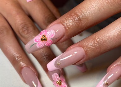 Close-up of floral nail art at Lozzy Nails in Brentwood, England, GB, showcasing intricate design.