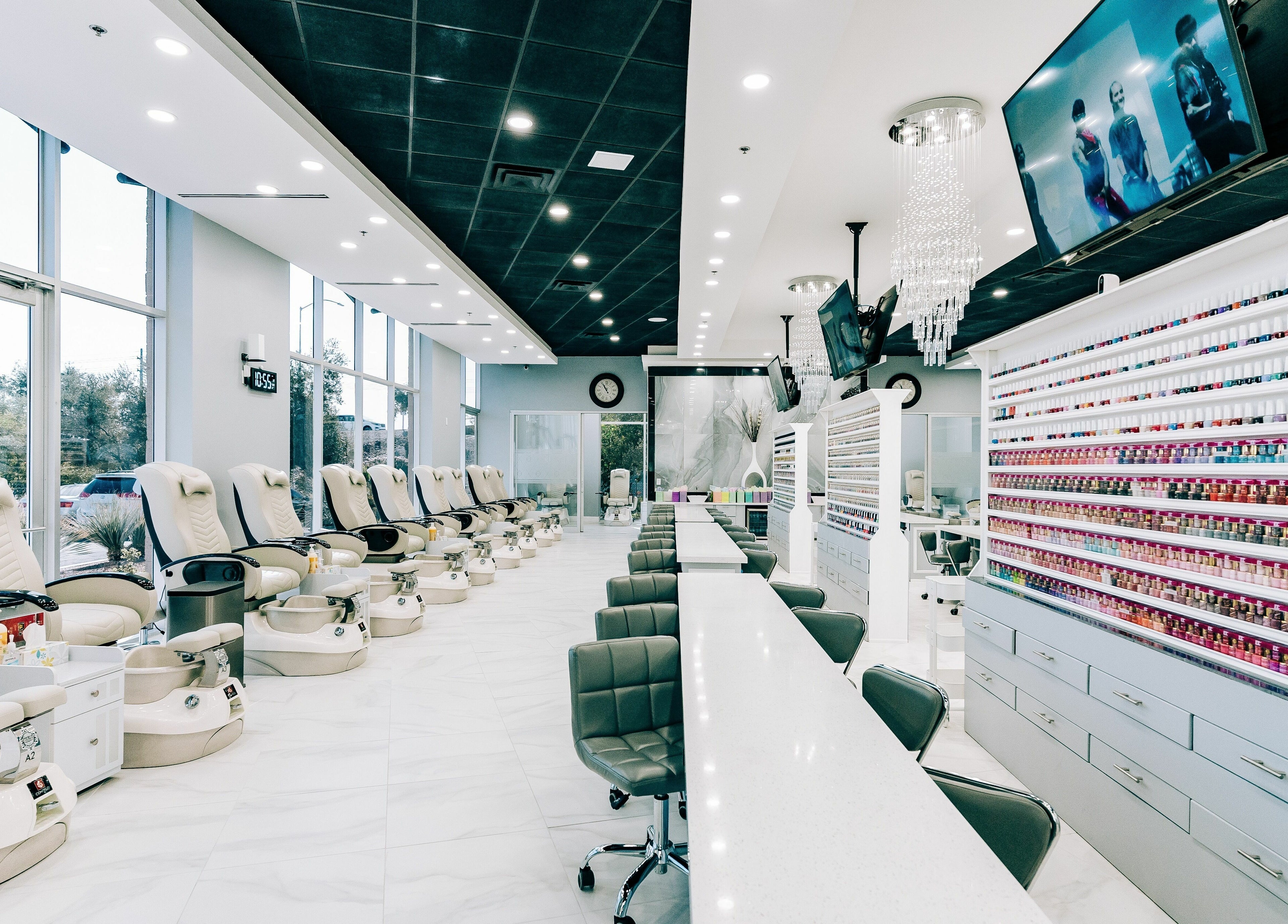 Modern pedicure chairs and nail polish display at Greenfield Nails and Spa - Chandler, Chandler, Arizona, US.