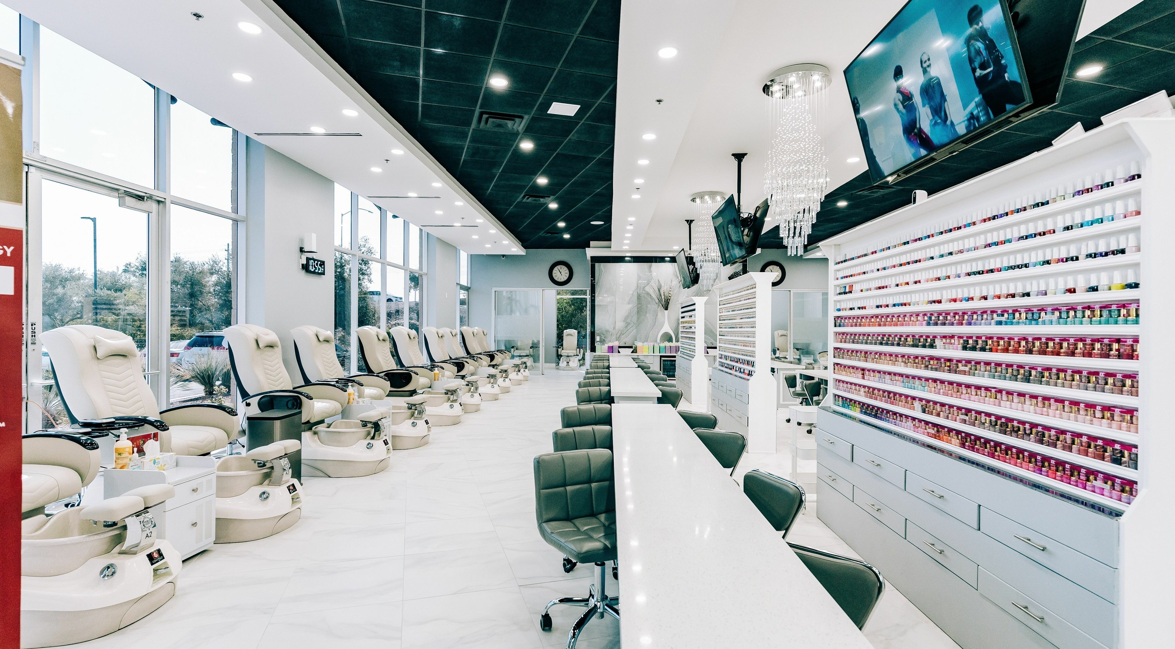 Modern pedicure chairs and nail polish display at Greenfield Nails and Spa - Chandler, Chandler, Arizona, US.