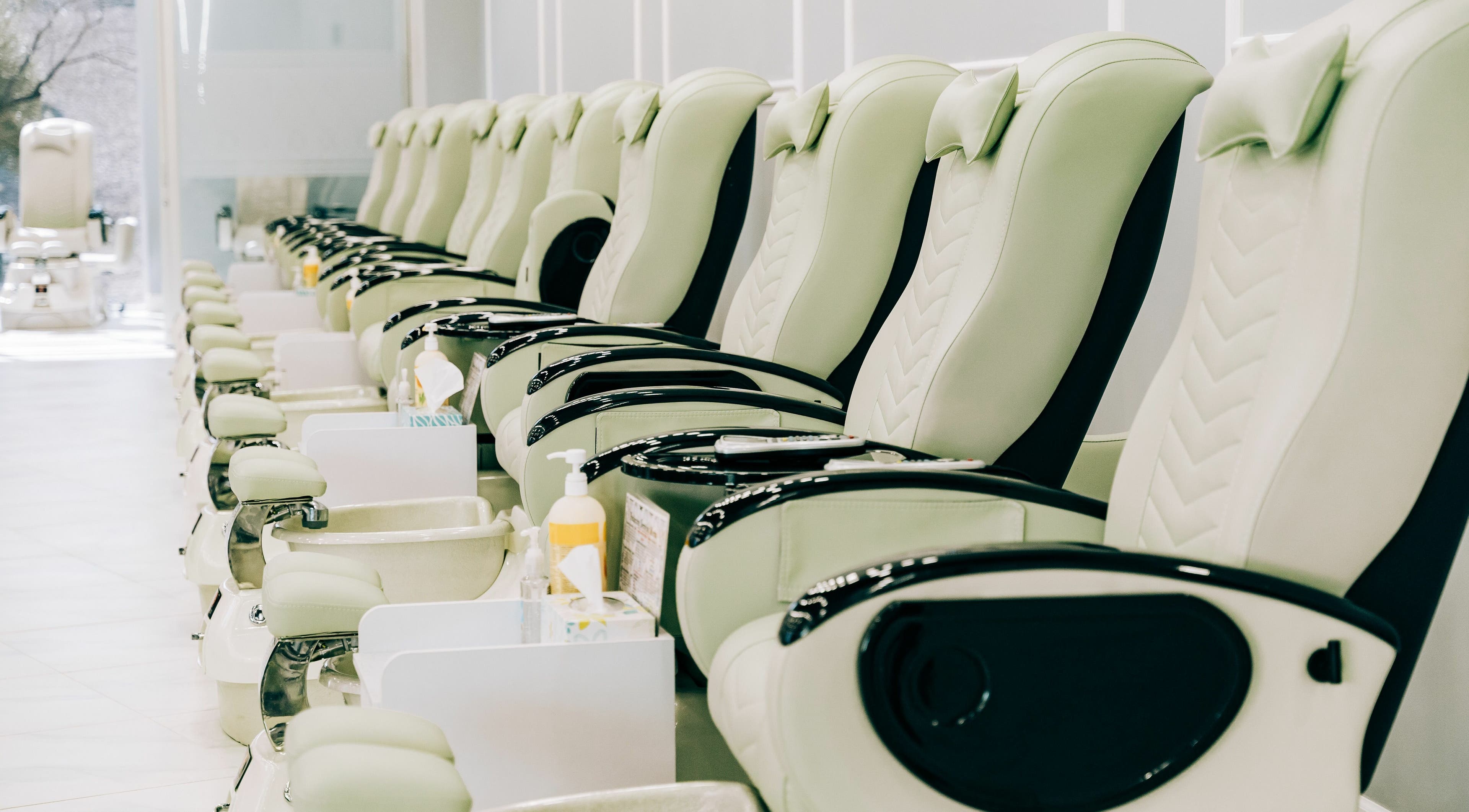 Luxurious pedicure chairs lined up at Greenfield Nails and Spa - Chandler, Chandler, Arizona, US.