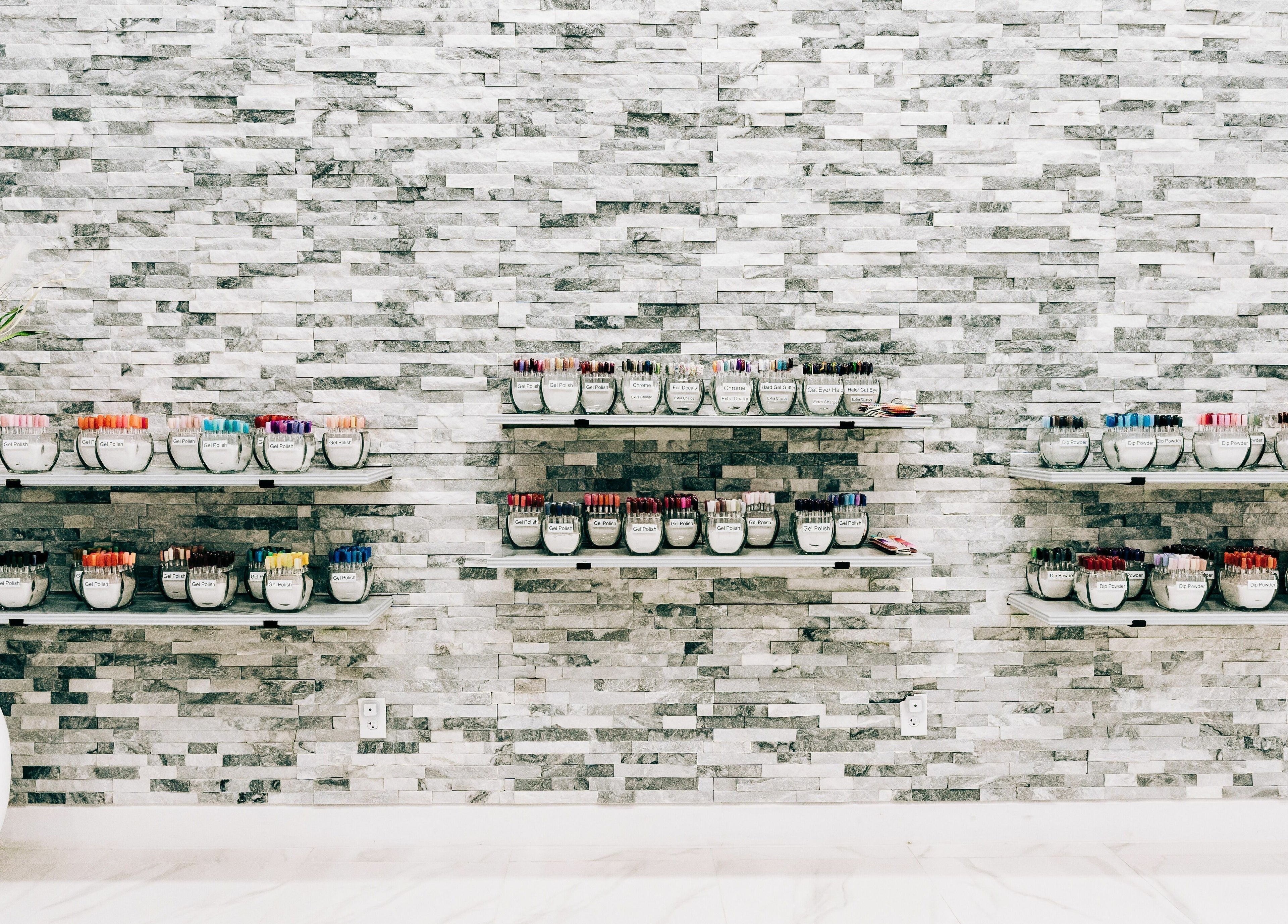 Nail polish display at Greenfield Nails and Spa - Chandler, Chandler, Arizona, US in modern décor.