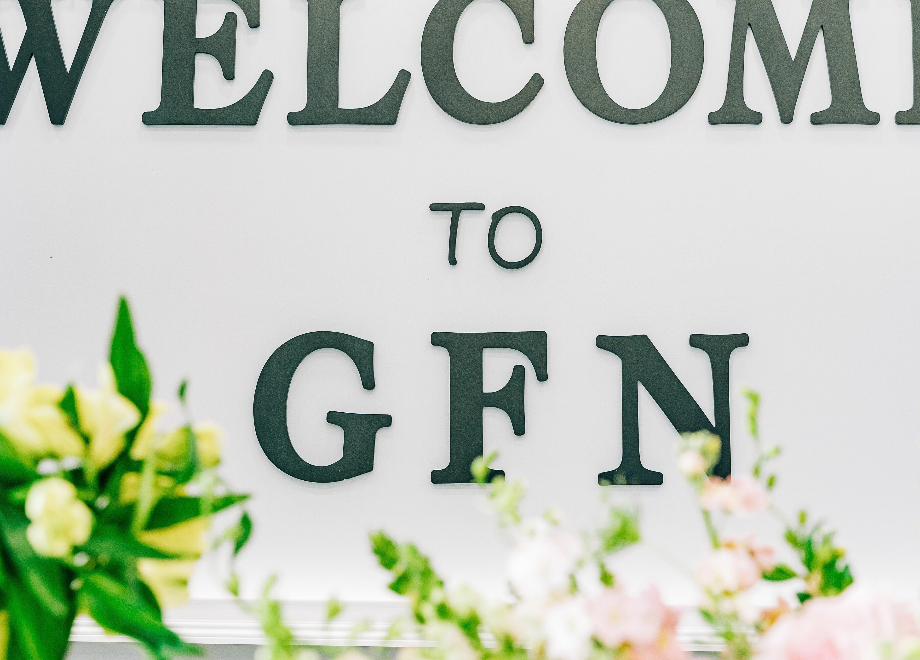Welcome sign at Greenfield Nails and Spa - Chandler in Chandler, Arizona. Elegant floral decor adds charm.